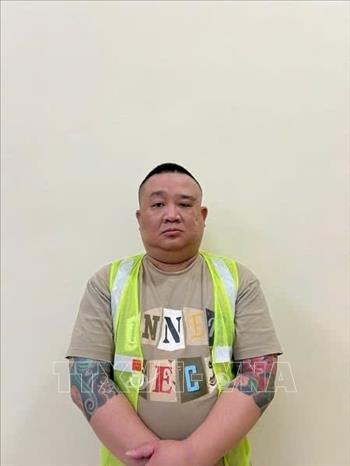 Đối tượng Nguyễn Ngọc Thắng tại cơ quan Công an. Ảnh - TTXVN phát