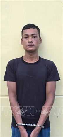 Danh Chơn (sinh năm 1996) tại cơ quan công an. Ảnh: TTXVN phát