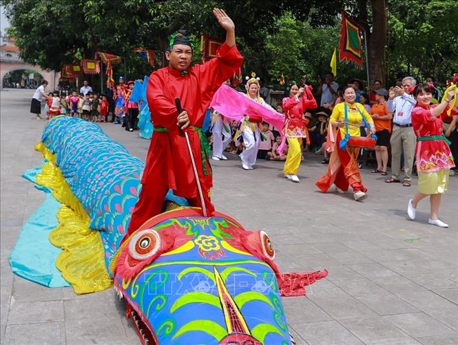 Đặc sắc múa Giảo long. Ảnh: Khánh Hoà - TTXVN