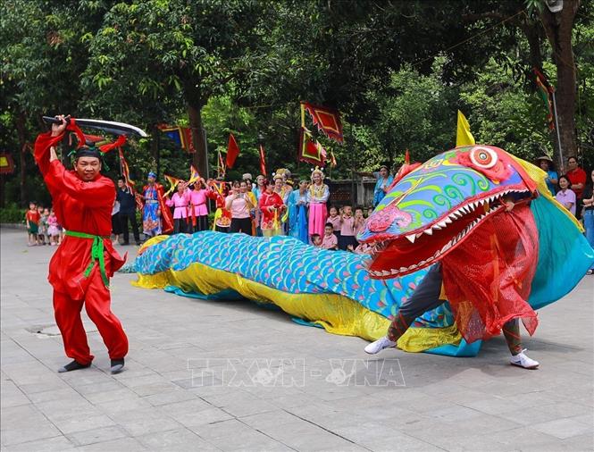 Đặc sắc múa Giảo long. Ảnh: Khánh Hoà - TTXVN