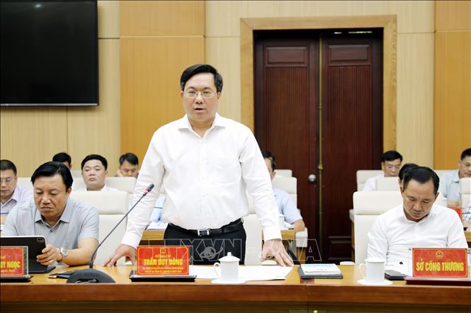 Chủ tịch UBND tỉnh Phú Thọ Trần Duy Đông phát biểu tại buổi làm việc. Ảnh: Tạ Toàn – TTXVN