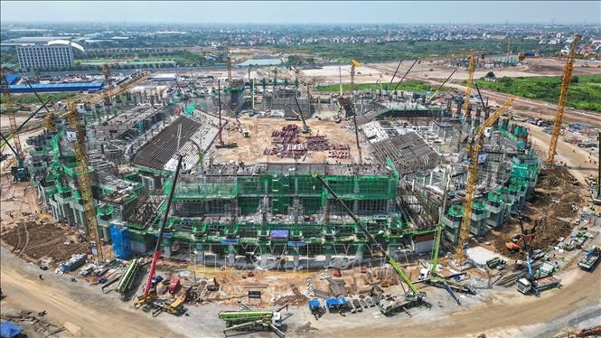 Dự kiến, sân vận động PVF sẽ hoàn thiện toàn bộ các hạng mục vào tháng 3/2027. Ảnh: Minh Quyết – TTXVN
