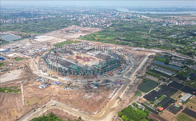 Dự kiến, sân vận động PVF sẽ hoàn thiện toàn bộ các hạng mục vào tháng 3/2027. Ảnh: Minh Quyết – TTXVN
