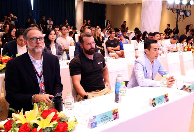 Delegates attend the opening ceremony. VNA Photo: Trần Lê Lâm