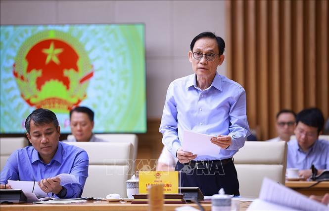 Bộ trưởng Bộ ngoại giao Lê Hoài Trung báo cáo kết quả thực hiện nhiệm vụ và phương hướng, nhiệm vụ trọng tâm của ngành ngoại giao. Ảnh: Dương Giang – TTXVN
