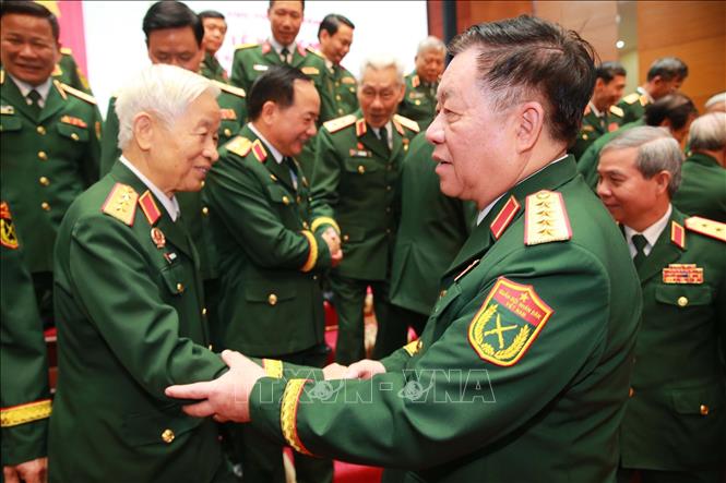 Đại tướng Nguyễn Trọng Nghĩa, Ủy viên Bộ Chính trị, Bí thư Trung ương Đảng, Chủ nhiệm Tổng cục Chính trị QĐND Việt Nam và các đại biểu. Ảnh: Trọng Đức - TTXVN