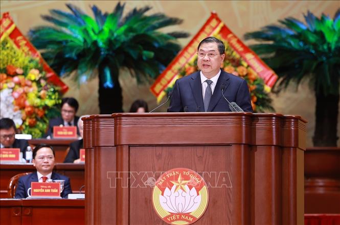 Ủy viên Bộ Chính trị, Phó Thủ tướng Thường trực Chính phủ Phạm Gia Túc báo cáo công tác phối hợp giữa Chính phủ và Mặt trận Tổ quốc Việt Nam. Ảnh: Dương Giang – TTXVN 
