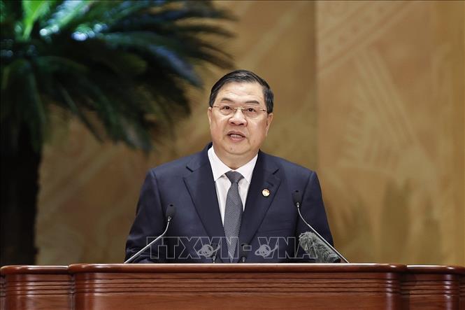Ủy viên Bộ Chính trị, Phó Thủ tướng Thường trực Chính phủ Phạm Gia Túc báo cáo công tác phối hợp giữa Chính phủ và Mặt trận Tổ quốc Việt Nam. Ảnh: Doãn Tấn - TTXVN