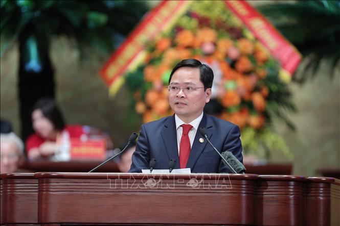 Đồng chí Nguyễn Anh Tuấn, Ủy viên Trung ương Đảng, Phó Chủ tịch UBTW MTTQ Việt Nam, Chủ tịch Tổng Liên đoàn Lao động Việt Nam trình bày tham luận: “Đồng hành cùng công nhân Việt Nam thi đua lao động sáng tạo, góp phần thực hiện thắng lợi các mục tiêu phát triển đất nước”. Ảnh: Minh Đức - TTXVN