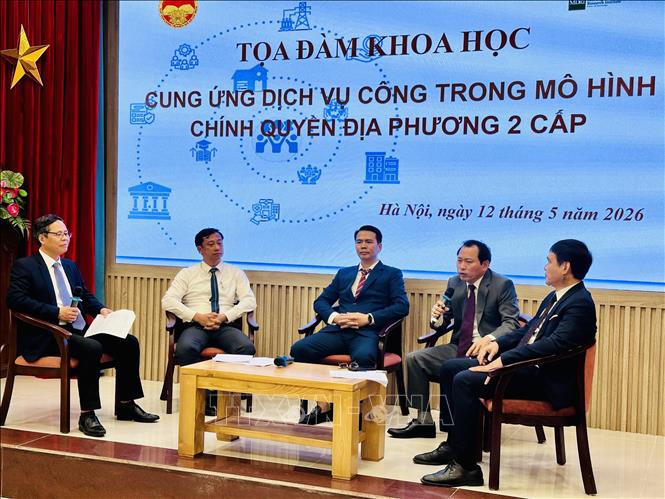 Các đại biểu trao đổi tại tọa đàm. Ảnh: Việt Đức - TTXVN