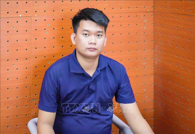 Đối tượng Hồ Bảo Khanh tại cơ quan Công an. Ảnh: TTXVN phát