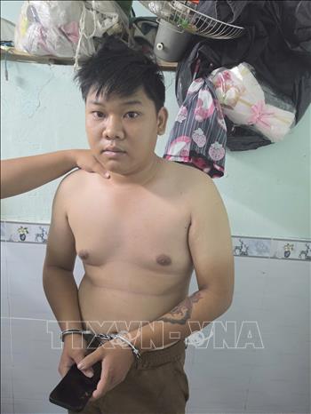 Huỳnh Đức Hùng (26 tuổi) bị lực lượng Công an đã bắt giữ tại phòng trọ thuộc phường Linh Trung, Thành phố Hồ Chí Minh. Ảnh: TTXVN phát