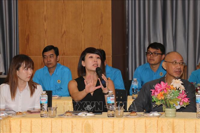 Đại diện Phòng nghiên cứu Liên minh Lao động thuộc Công đoàn Quốc gia Singapore (NTUC) phát biểu tại buổi làm việc với Công đoàn TP. Hồ Chí Minh. Ảnh: Thanh Vũ-TTXVN