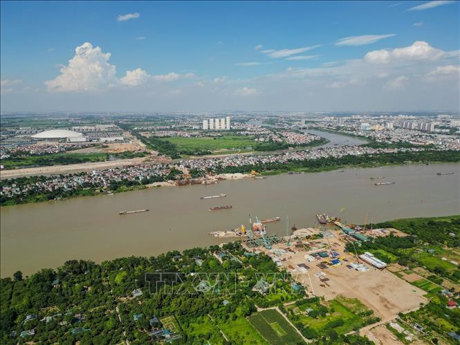 Dự án cầu Tứ Liên và đường dẫn với tổng mức đầu tư gần 19.830 tỷ đồng đang bước vào giai đoạn thi công. Ảnh: Lê Đông - TTXVN