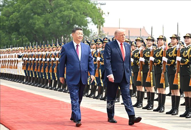 Chủ tịch Trung Quốc Tập Cận Bình và Tổng thống Mỹ Donald Trump tại lễ đón ở Bắc Kinh ngày 14/5/2026. Ảnh: THX/TTXVN