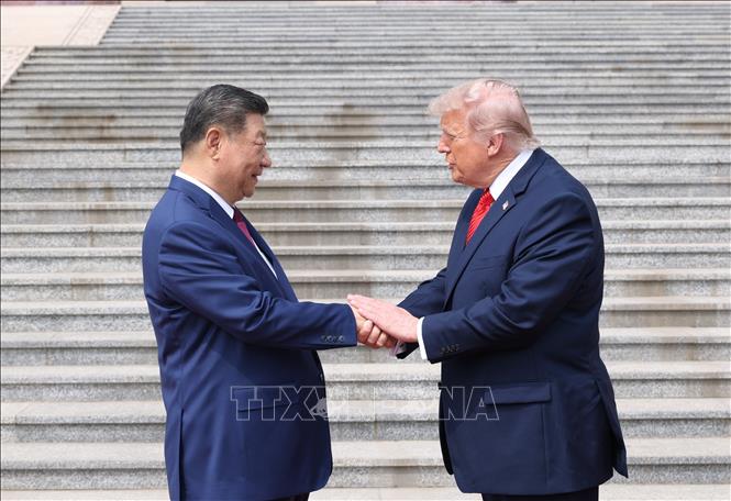 Chủ tịch Trung Quốc Tập Cận Bình chào đón Tổng thống Mỹ Donald Trump tại Bắc Kinh ngày 14/5/2026. Ảnh: THX/TTXVN