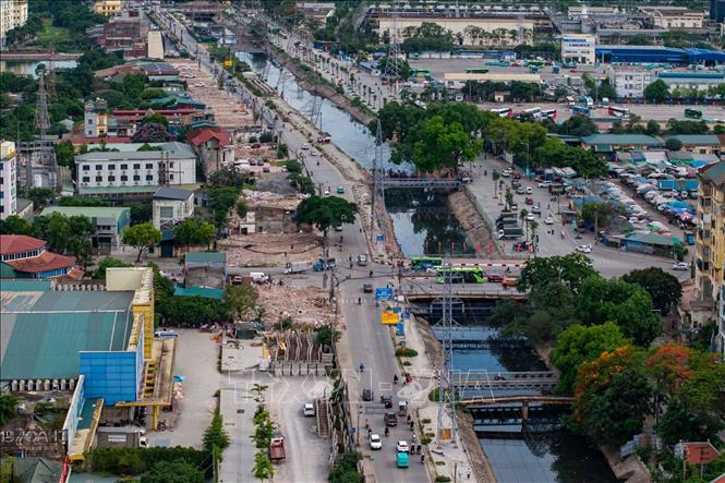 Khu vực nút giao Tam Trinh và tuyến đường Vành đai 2,5 đang được đẩy nhanh tiến độ GPMB nhằm phục vụ mở rộng tuyến đường Tam Trinh. Ảnh: Phạm Tuấn Anh - TTXVN