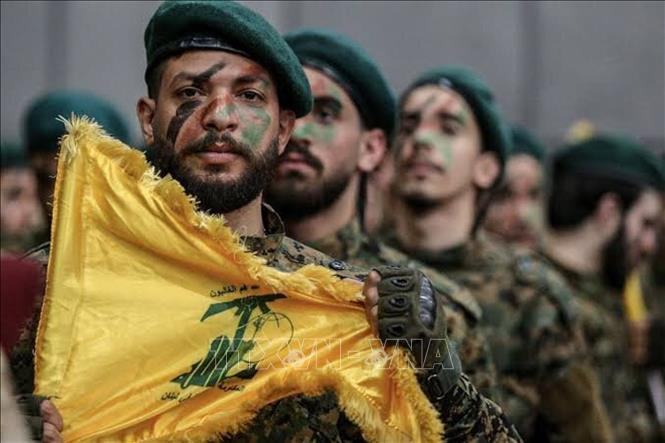 Các tay súng Phong trào Hezbollah. Ảnh: MNA/TTXVN