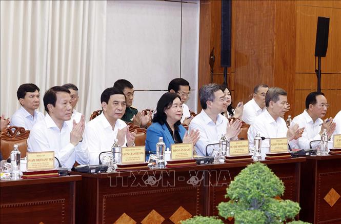 Các đại biểu tham dự buổi làm việc. Ảnh: Thống Nhất – TTXVN