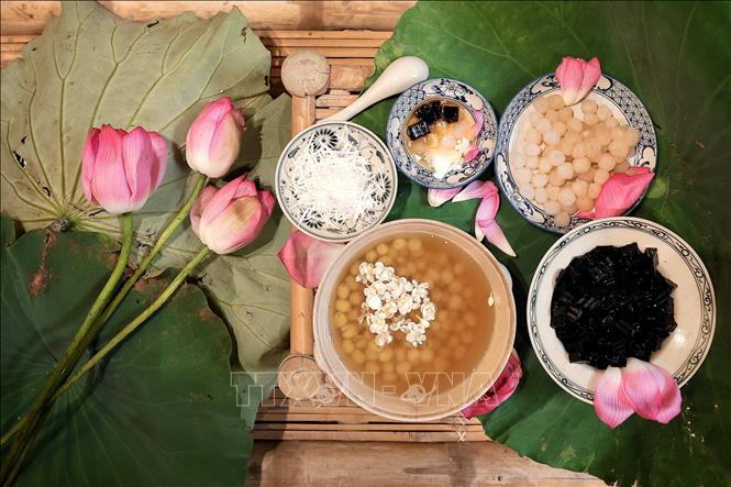 Vietnamese snacks made from lotus are featured together with lotus tea, recreating Hanoi traditional flavours. VNA Photo: Phạm Tuấn Anh
