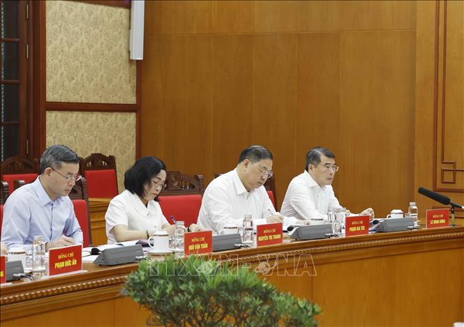 Các đại biểu tham dự buổi làm việc. Ảnh: Thống Nhất - TTXVN