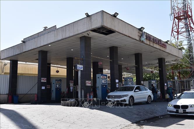 Một trạm xăng ở Damascus, Syria. Ảnh: THX/TTXVN