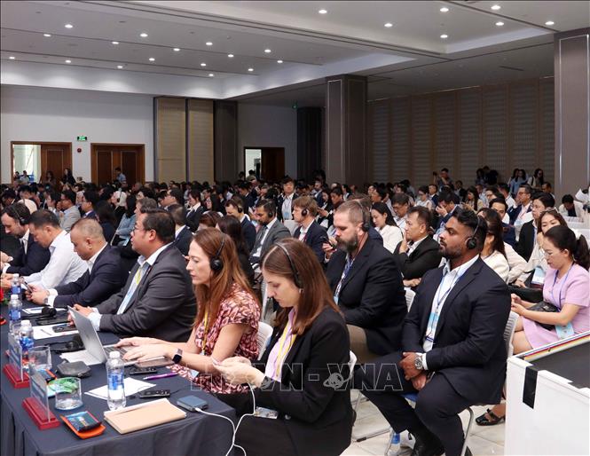 Delegates from Australian businesses and universities attend the event. VNA Photo: Xuân Khu