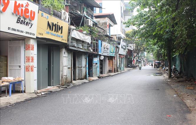 Đoạn đường Kẻ Vẽ (phường Đông Ngạc, Hà Nội) đã hoàn trả mặt đường sau khi thi công hạng mục chống úng ngập. Ảnh: Nguyễn Thắng - TTXVN