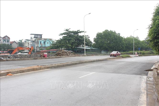 Đoạn cống ngầm phục vụ tiêu thoát nước qua đường An Dương Vương đã hoàn trả kết cấu, mặt đường, phục vụ nhu cầu đi lại của người dân. Ảnh: Nguyễn Thắng - TTXVN