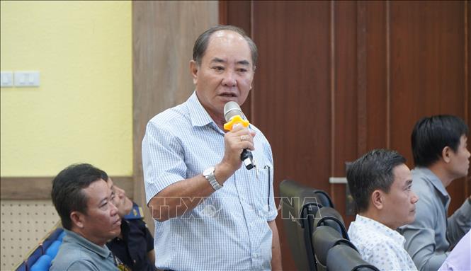 Đại diện doanh nghiệp trao đổi tại Hội nghị. Ảnh: Nhựt An - TTXVN
