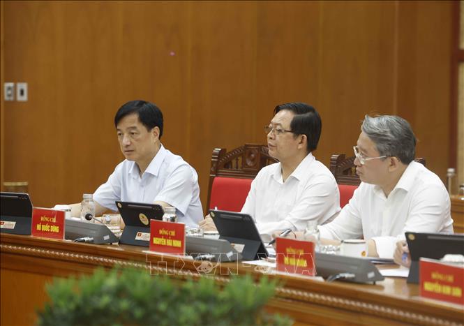 Các đại biểu dự buổi làm việc. Ảnh: Thống Nhất – TTXVN 