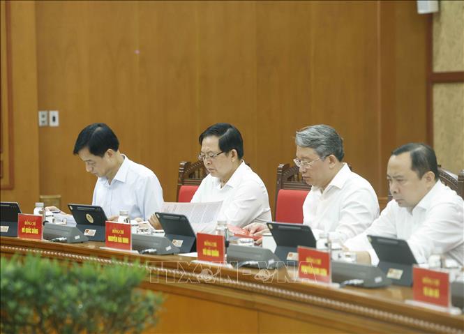 Các đại biểu dự buổi làm việc. Ảnh: Thống Nhất – TTXVN
