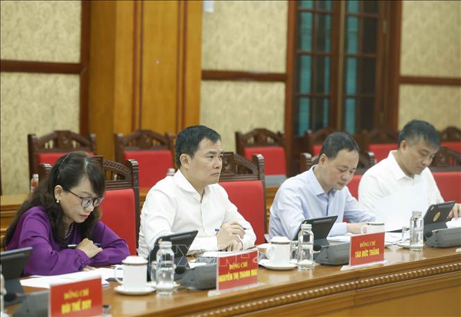Các đại biểu dự buổi làm việc. Ảnh: Thống Nhất – TTXVN
