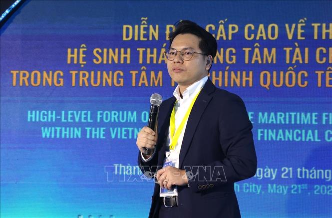 Ông Nguyễn Hoàng Anh, Quản lý Dự án Cấp cao Roland Berger Đông Nam Á, đơn vị tư vấn dự án trình bày tại Diễn đàn. Ảnh: Hứa Chung-TTXVN