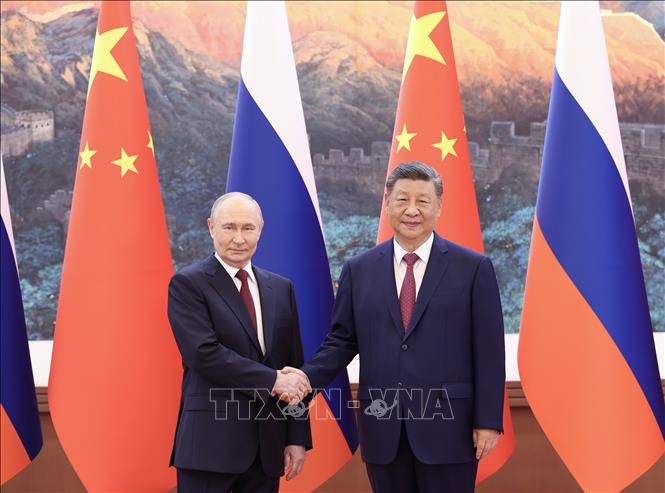 Tổng thống Nga Vladimir Putin và Chủ tịch Trung Quốc Tập Cận Bình tại cuộc gặp ở Bắc Kinh ngày 20/5/2026. Ảnh: THX/TTXVN