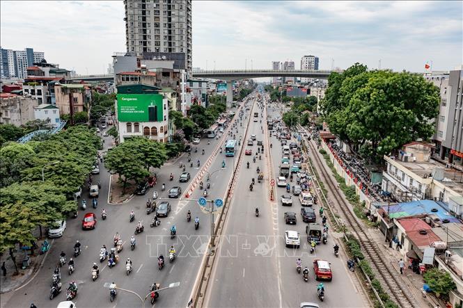 Tuyến Giải Phóng kéo dài về phía Nam thành phố có mật độ dân cư và các hoạt động thương mại, dịch vụ phát triển dọc hai bên đường. Ảnh: Trung Nguyên - TTXVN