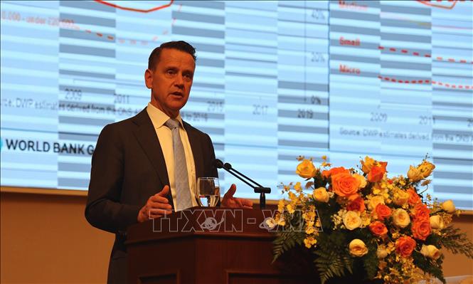 Ông R.Mark Davis, Chuyên gia tài chính Cấp cao thuộc Ban Tài chính, Năng lực Cạnh tranh & Đổi mới Toàn cầu, Ngân hàng Thế giới, chia sẻ một số kinh nghiệm quốc tế về vai trò của chương trình bảo hiểm hưu trí bổ sung. Ảnh: Hứa Chung-TTXVN