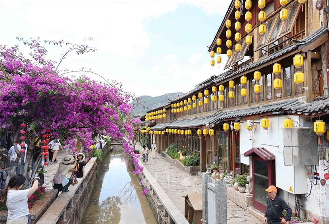 Nét đẹp văn hóa cùng những giá trị truyền thống lâu đời vẫn tồn tại nơi Lệ Giang cổ trấn, biến vùng đất này trở thành điểm dừng chân trong mơ của các tâm hồn yêu khám phá. Ảnh: Công Tuyên - PV TTXVN tại Trung Quốc