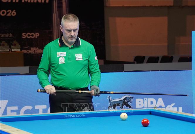 Frederic Caudron - nhà vô địch Giải Billiards Carom 3 băng Cúp Thế giới TP. Hồ Chí Minh 2026 thi đấu trong trận chung kết tại Nhà thi đấu Nguyễn Du. Ảnh: Trung Tuyến - TTXVN