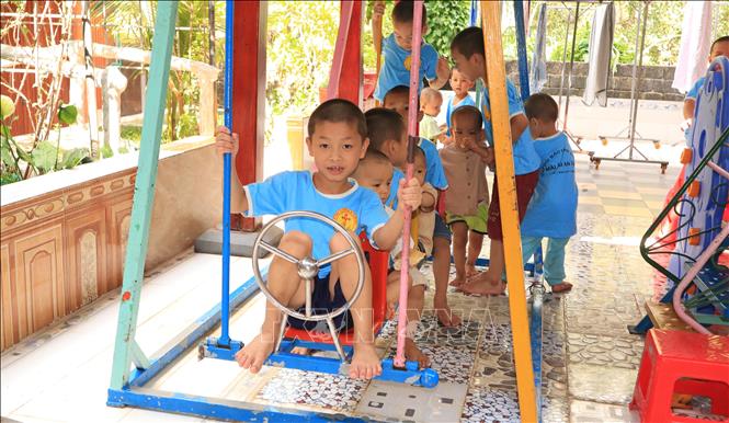 Trong khuôn viên mái ấm hiện có phòng học nhạc, phòng y tế, thư viện, phòng máy tính và khu vui chơi dành cho trẻ em. Ảnh: Đậu Tất Thành - TTXVN