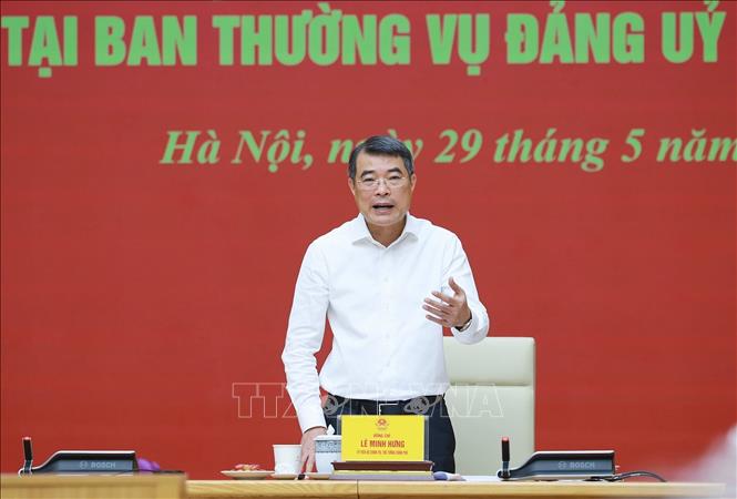 Đồng chí Lê Minh Hưng, Ủy viên Bộ Chính trị, Bí thư Đảng ủy, Thủ tướng Chính phủ phát biểu. Ảnh: Dương Giang – TTXVN 
