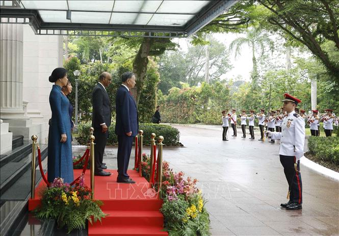 Lễ đón Tổng Bí thư, Chủ tịch nước Tô Lâm và Phu nhân được tổ chức trọng thể tại trụ sở Bộ Ngoại giao ở thủ đô Singapore. Ảnh: Thống Nhất – TTXVN