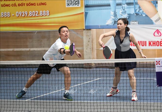 Các vận động viên tranh tài các hạng mục môn Pickleball. Ảnh: Danh Lam -TTXVN