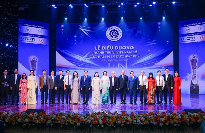 Các đại biểu tham dự chương trình Biểu dương Thành tựu tác động vì Việt Nam Số (Vietnam i4 Impact Awards) năm 2026. Ảnh: Hoàng Hiếu - TTXVN