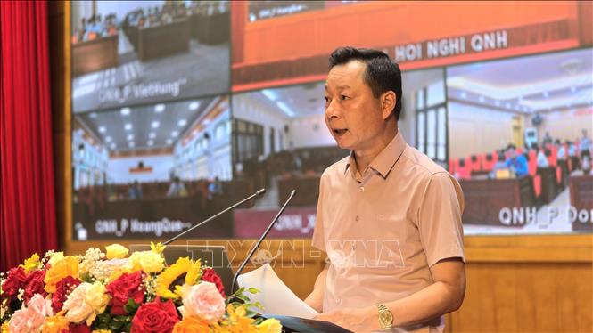 Ông Lê Văn Ánh, Phó Chủ tịch UBND tỉnh, Chủ tịch Hội đồng phối hợp phổ biến, giáo dục pháp luật tỉnh Quảng Ninh phát biểu tại hội nghị. Ảnh: Thanh Vân - TTXVN 