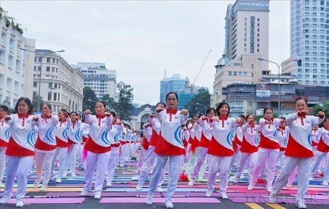 Người cao tuổi tham gia đồng diễn dưỡng sinh tại Hội thao đồng diễn thể dục dưỡng sinh, Yoga năm 2022, tại TP Hồ Chí Minh, tháng 10/2022. Ảnh: Thu Hương - TTXVN