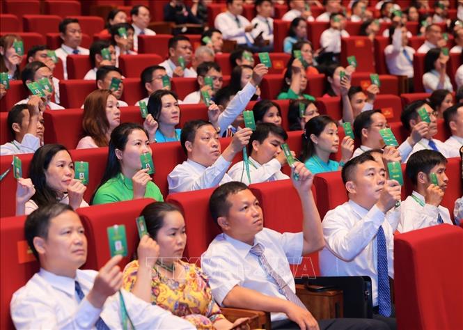 Các đại biểu biểu quyết Đề án nhân sự Ban Chấp hành Hội Nông dân Việt Nam khoá IX, nhiệm kỳ 2026 - 2031. Ảnh: Hoàng Hiếu - TTXVN