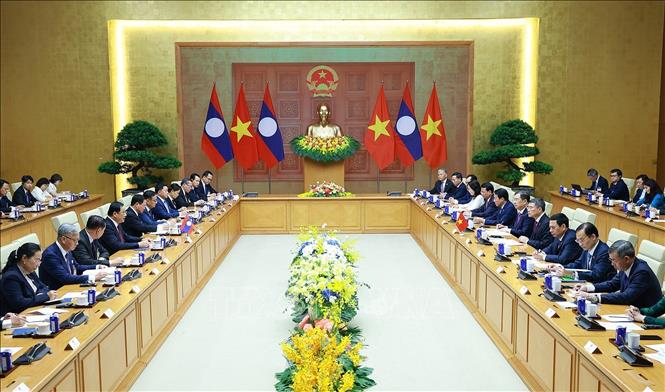 Thủ tướng Lê Minh Hưng hội đàm với Thủ tướng Lào Sonexay Siphandone. Ảnh: Dương Giang – TTXVN

