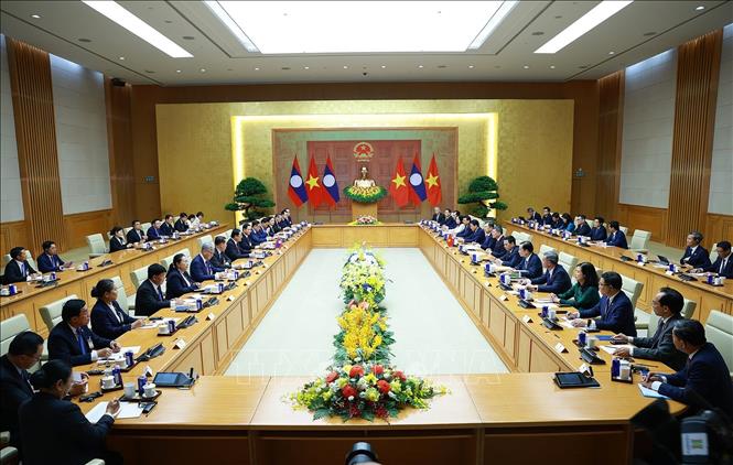 Thủ tướng Lê Minh Hưng hội đàm với Thủ tướng Lào Sonexay Siphandone. Ảnh: Dương Giang – TTXVN
