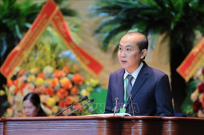 Đồng chí Phan Như Nguyện, Phó Chủ tịch Thường trực Ban Chấp hành Trung ương Hội Nông dân Việt Nam báo cáo tóm tắt kết quả thực hiện Nghị quyết. Ảnh: Lê Đông - TTXVN